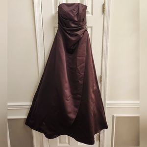 Satin gown with side drape & brooch